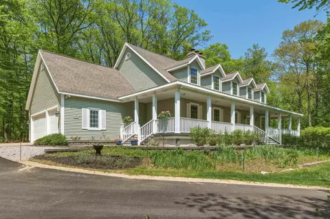 8745 Wheeler Oaks, Williamsburg, MI 49690