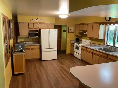 Kitchen - 3300 E Arnold Lk, Harrison, MI 48625 photo 2 of 9