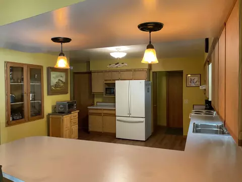 Kitchen - 3300 E Arnold Lk, Harrison, MI 48625 photo 3 of 9