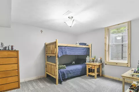 Bedroom - 10694 N Mac, Irons, MI 49644 photo 6 of 7