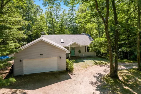 9163 Youker, Grawn, MI 49637