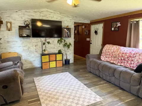 Living - 9899 E 18 12, Manton, MI 49663 photo 1 of 2