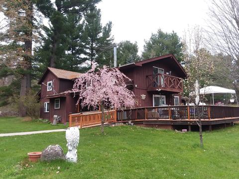 1051 M-33, Comins, MI 48619 photo 1