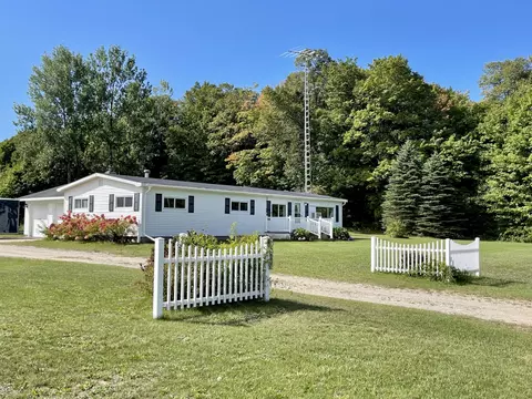 7487 Skop Rd, Elmira, MI 49730