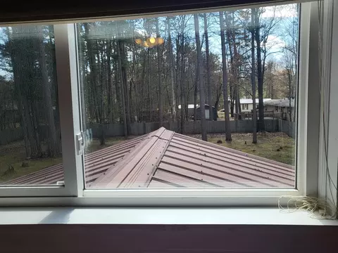 Exterior - 6571 Nottingham Dr, Grayling, MI 49738 photo 11 of 14