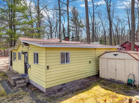 Exterior - 8859 Hillcrest Rd, Roscommon, MI 48653 photo 4 of 9