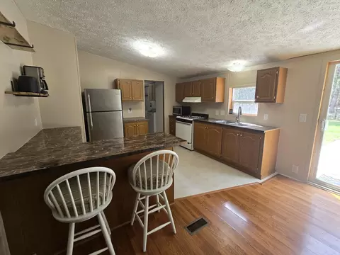 Kitchen - 14 Loshaw Dr, Vanderbilt, MI 49795 photo 1 of 3