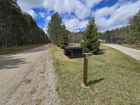 Exterior - 14 Loshaw Dr, Vanderbilt, MI 49795 photo 14 of 15