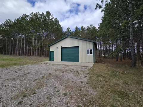 Exterior - 14 Loshaw Dr, Vanderbilt, MI 49795 photo 5 of 15
