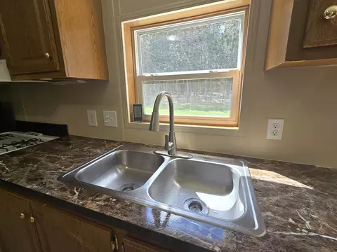 Kitchen - 14 Loshaw Dr, Vanderbilt, MI 49795 photo 3 of 3