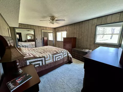Bedroom - 7123 Hiawatha Dr, Frederic, MI 49733 photo 2 of 8