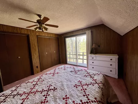Bedroom - 7123 Hiawatha Dr, Frederic, MI 49733 photo 6 of 8
