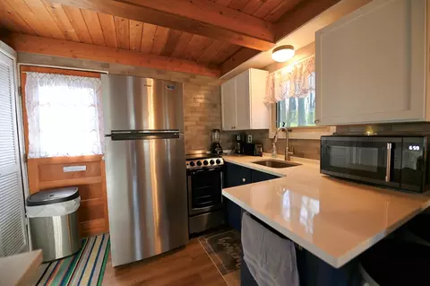 Kitchen - 221 Jackson Blvd, Roscommon, MI 48653 photo 1 of 2