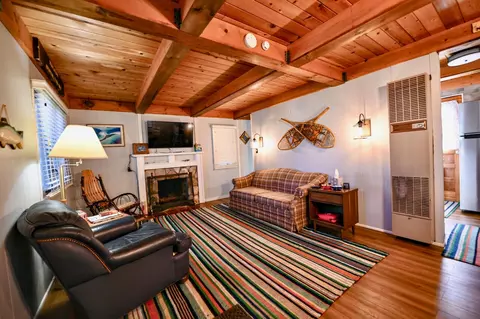 Living - 221 Jackson Blvd, Roscommon, MI 48653 photo 1 of 2