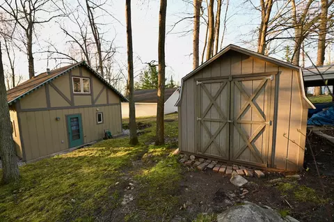 Exterior - 221 Jackson Blvd, Roscommon, MI 48653 photo 3 of 4