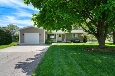 Exterior - 170 Riverside Dr, Cheboygan, MI 49721 photo 8 of 13
