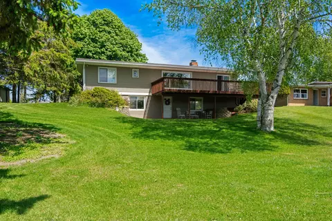 Exterior - 170 Riverside Dr, Cheboygan, MI 49721 photo 2 of 13