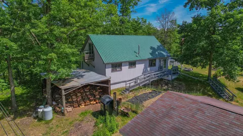 111 E Al Heiden Rd, Harrison, MI 48625 photo 1