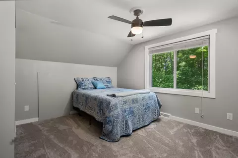 Bedroom - 5900 Agren Rd, Lewiston, MI 49756 photo 4 of 10