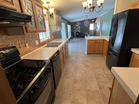 Kitchen - 102 Mcgregor Rd, Vanderbilt, MI 49795 photo 4 of 7