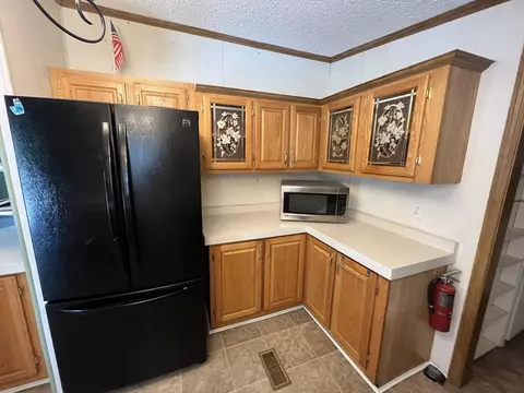 Kitchen - 102 Mcgregor Rd, Vanderbilt, MI 49795 photo 3 of 7