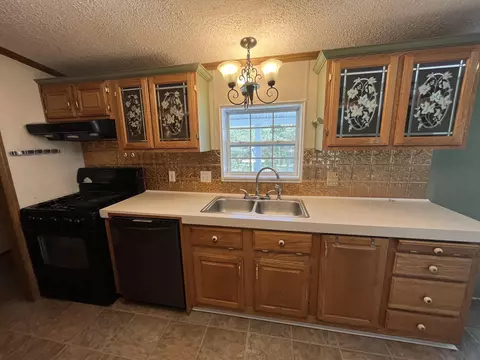 Kitchen - 102 Mcgregor Rd, Vanderbilt, MI 49795 photo 2 of 7