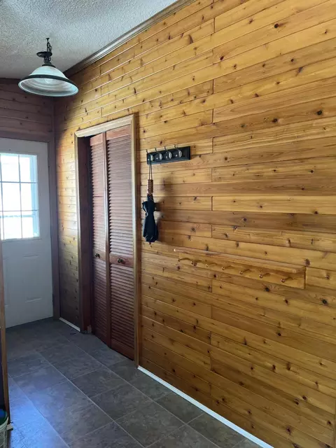 Entry Way - 102 Mcgregor Rd, Vanderbilt, MI 49795 photo 1 of 2