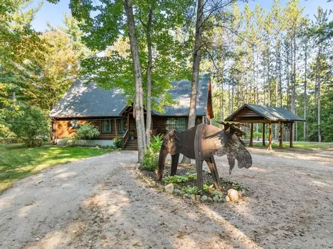 Exterior - 6885 Maple River Rd, Brutus, MI 49716 photo 5 of 10