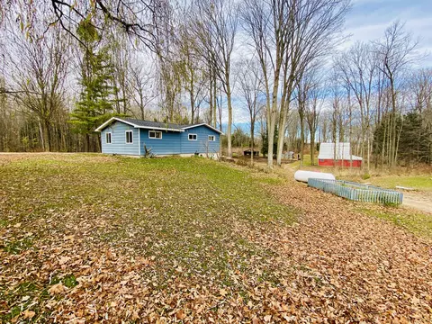 Exterior - 6671 E Arnold Lake Rd, Harrison, MI 48625 photo 7 of 26