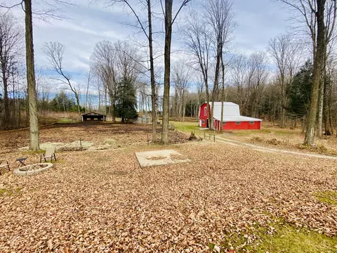Exterior - 6671 E Arnold Lake Rd, Harrison, MI 48625 photo 9 of 26