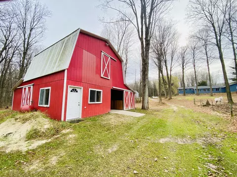 Exterior - 6671 E Arnold Lake Rd, Harrison, MI 48625 photo 11 of 26