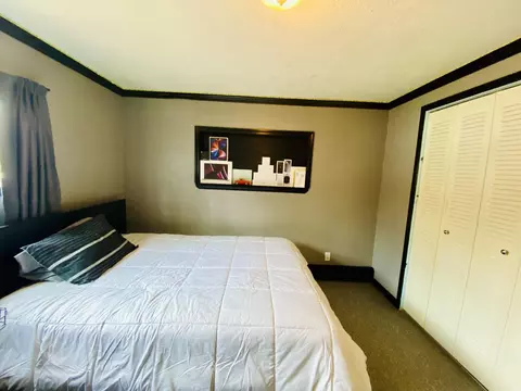 Bedroom - 6671 E Arnold Lake Rd, Harrison, MI 48625 photo 3 of 8
