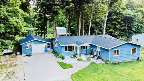 6671 E Arnold Lake Rd, Harrison, MI 48625