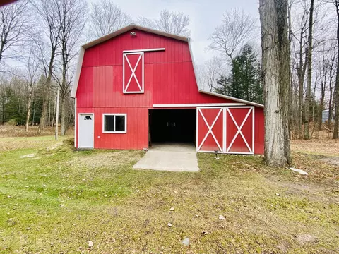 Exterior - 6671 E Arnold Lake Rd, Harrison, MI 48625 photo 1 of 26