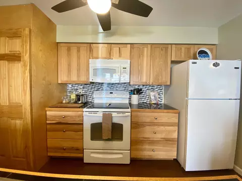 Kitchen - 130 Flag Point Dr #2 1, Roscommon, MI 48653 photo 12 of 14