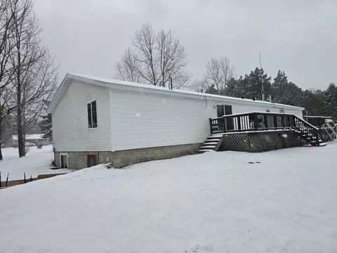 Exterior - 5210 Pinecrest Drive Lewiston Mi 49756 Dr, Lewiston, MI 49756 photo 4 of 7