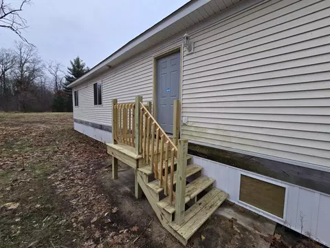 Exterior - 6841 E Gladwin Rd, Harrison, MI 48625 photo 2 of 9