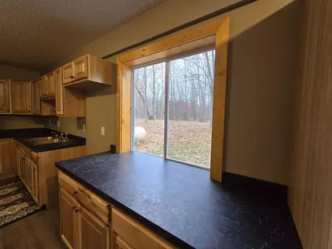 Kitchen - 6841 E Gladwin Rd, Harrison, MI 48625 photo 1 of 2