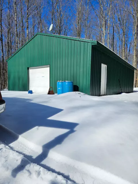 7664 Dickinson Rd, Frederic, MI 49733 photo 1