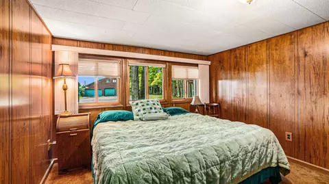 Bedroom - 5665 M-33, Comins, MI 48619 photo 1 of 3
