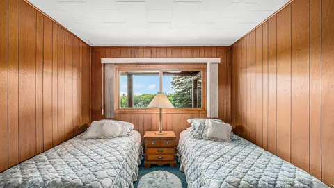 Bedroom - 5665 M-33, Comins, MI 48619 photo 2 of 3