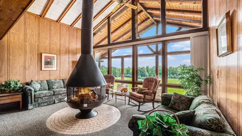 Living - 5665 M-33, Comins, MI 48619 photo 3 of 3