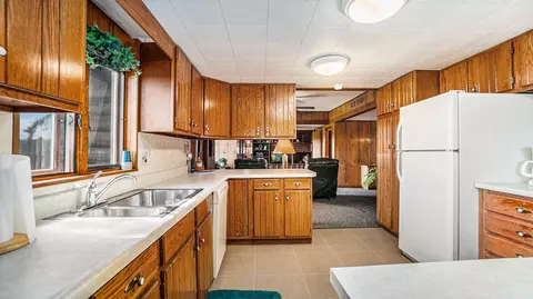 Kitchen - 5665 M-33, Comins, MI 48619 photo 4 of 5