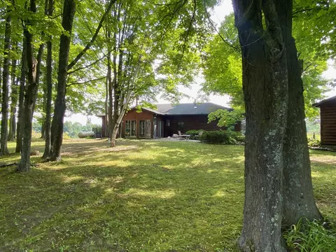 Exterior - 5665 M-33, Comins, MI 48619 photo 5 of 12