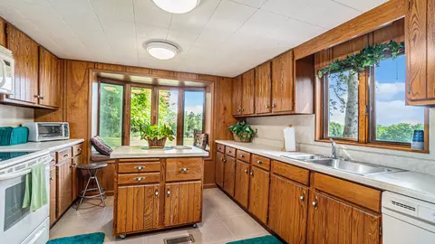 Kitchen - 5665 M-33, Comins, MI 48619 photo 3 of 5