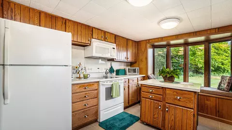 Kitchen - 5665 M-33, Comins, MI 48619 photo 5 of 5