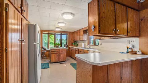 Kitchen - 5665 M-33, Comins, MI 48619 photo 2 of 5