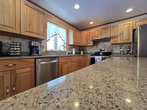 Kitchen - 2281 Pearsall Rd, Fairview, MI 48621 photo 4 of 10