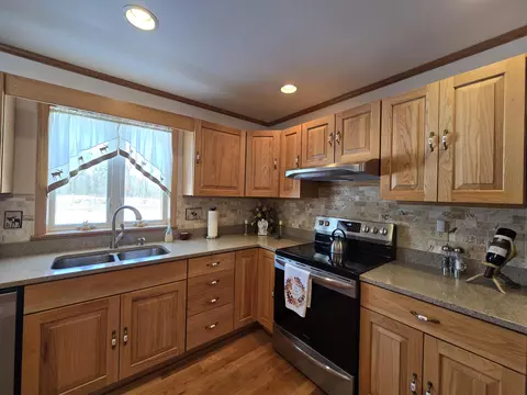 Kitchen - 2281 Pearsall Rd, Fairview, MI 48621 photo 9 of 10