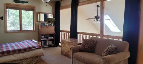 Bedroom - 14711 Hemlock Ln, Ocqueoc, MI 49759 photo 9 of 16